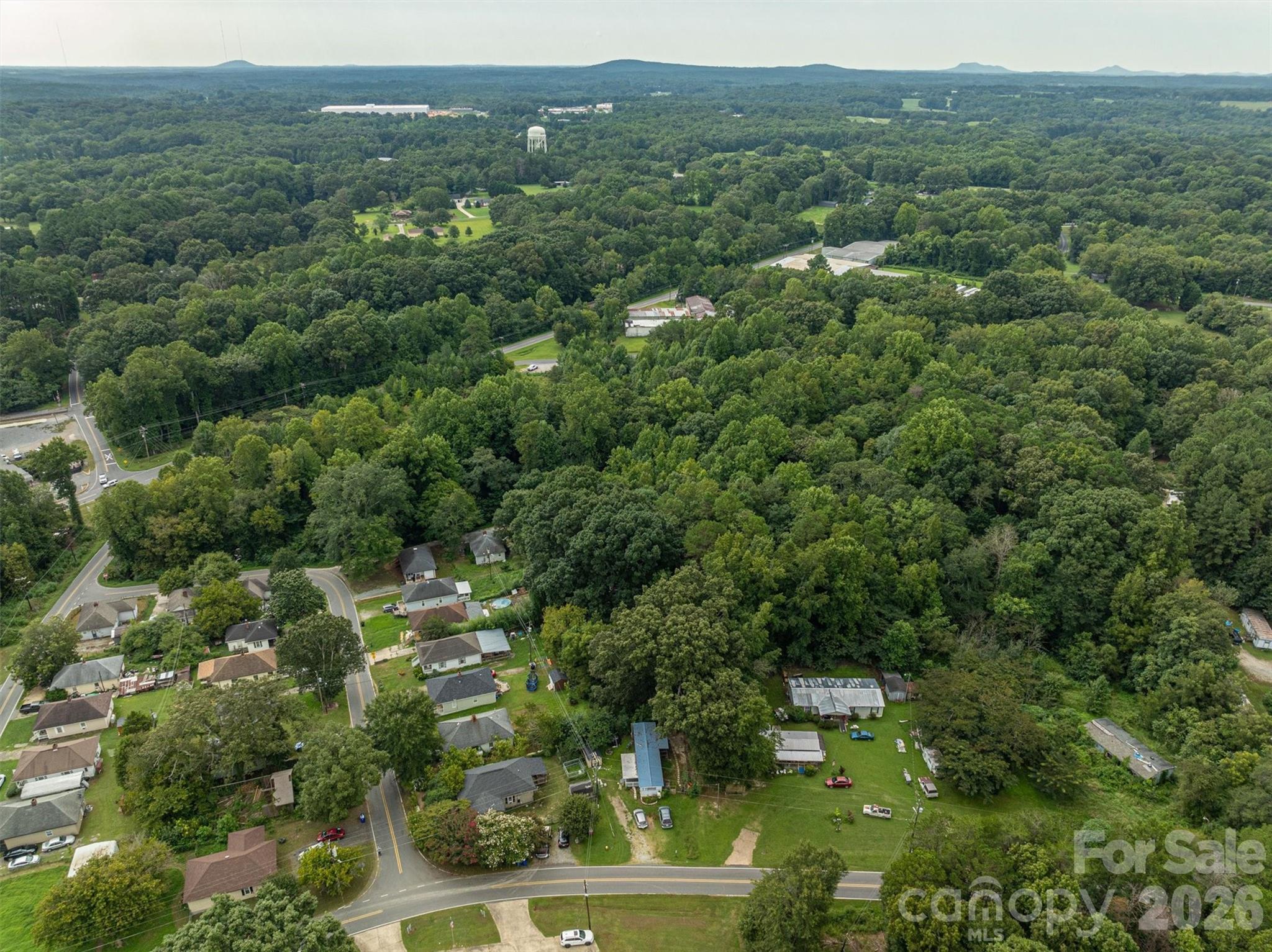 1156 Lyn Well Road Lincolnton, NC 28092 - Photo 5 of 15 an aerial view of residential houses with outdoor space and trees