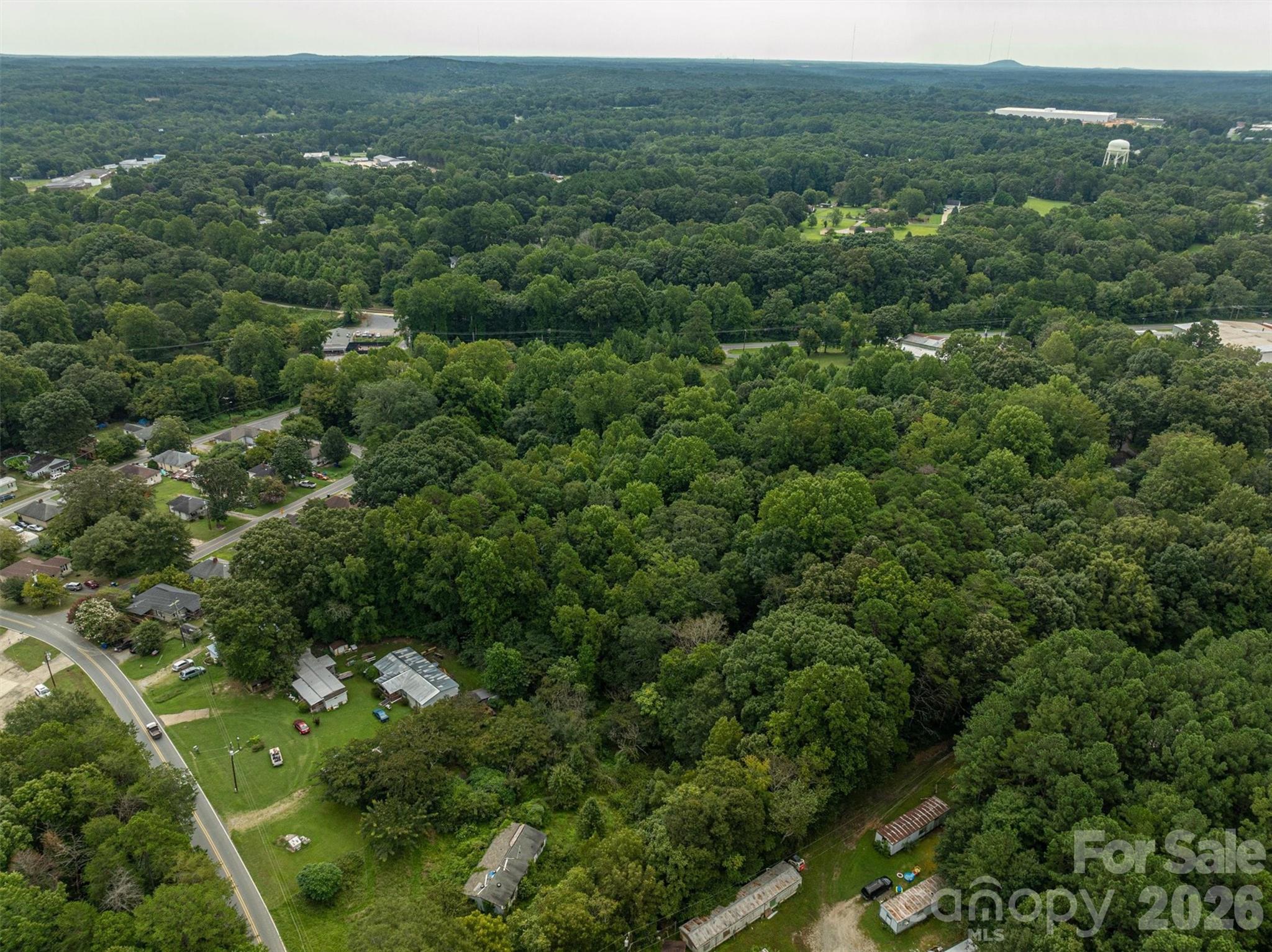 1156 Lyn Well Road Lincolnton, NC 28092 - Photo 6 of 15 an aerial view of residential houses with outdoor space and trees