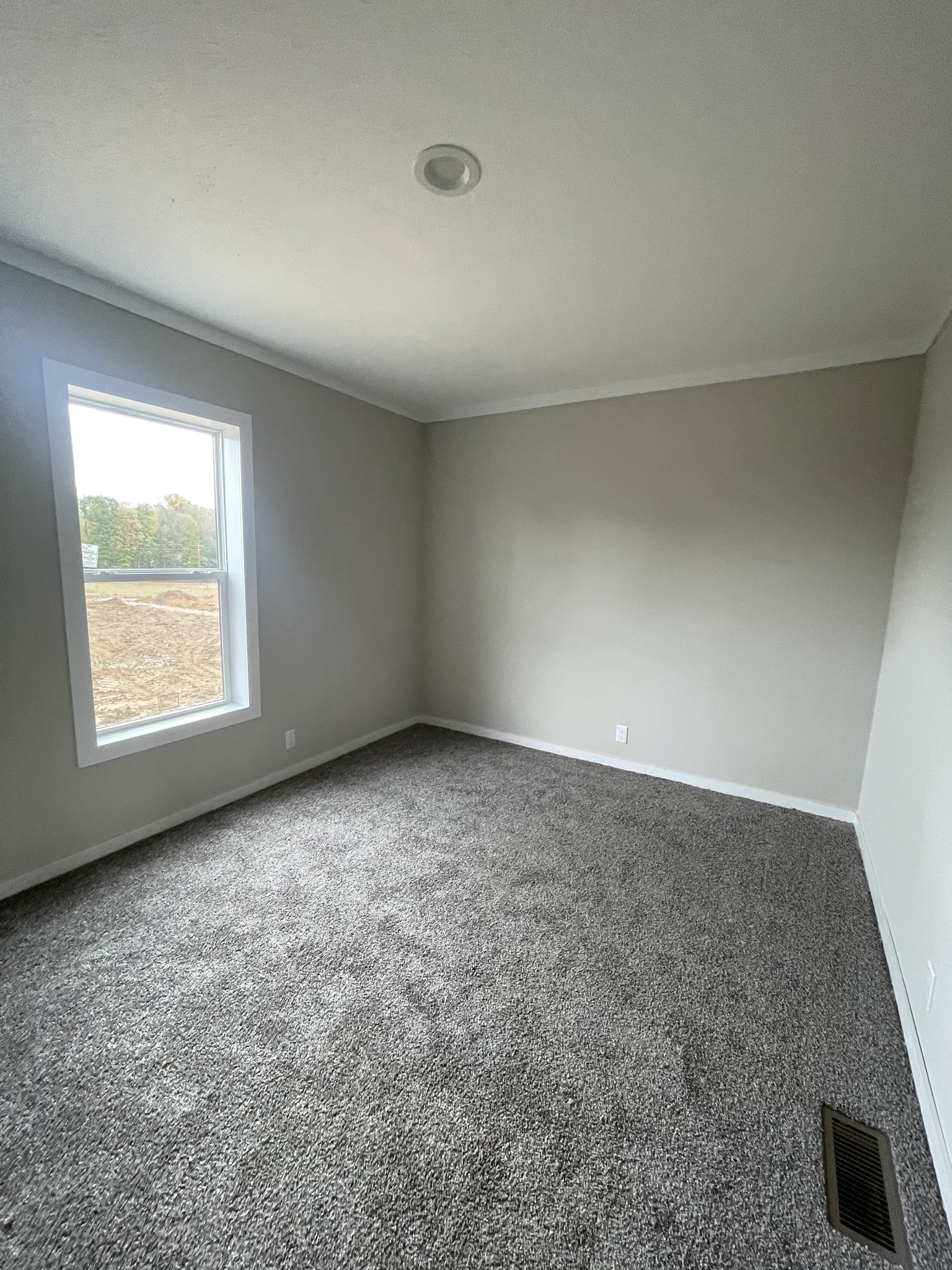881 White Springs Road Lafayette, TN 37083 - Photo 11 of 16 an empty room with windows