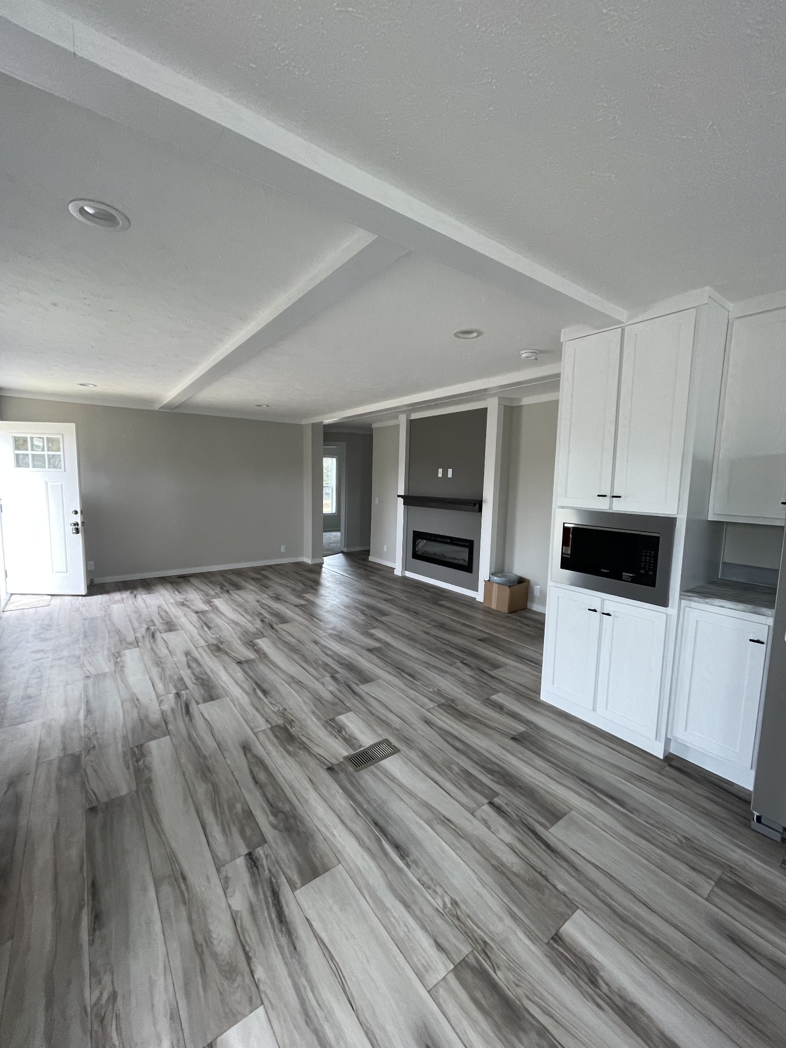 881 White Springs Road Lafayette, TN 37083 - Photo 14 of 16 a view of kitchen with microwave and cabinets