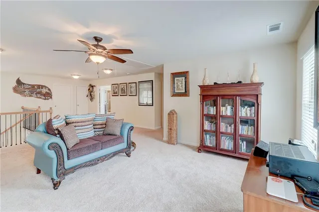 a bathroom with a tub shower and sink