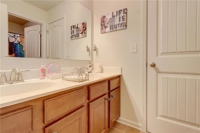 a swimming pool with some trees in the background