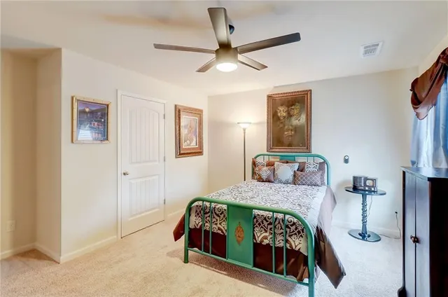 a aerial view of a house with a yard