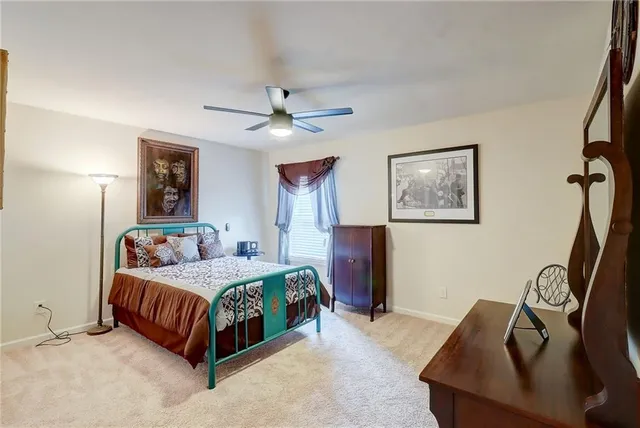 a aerial view of a house with a yard