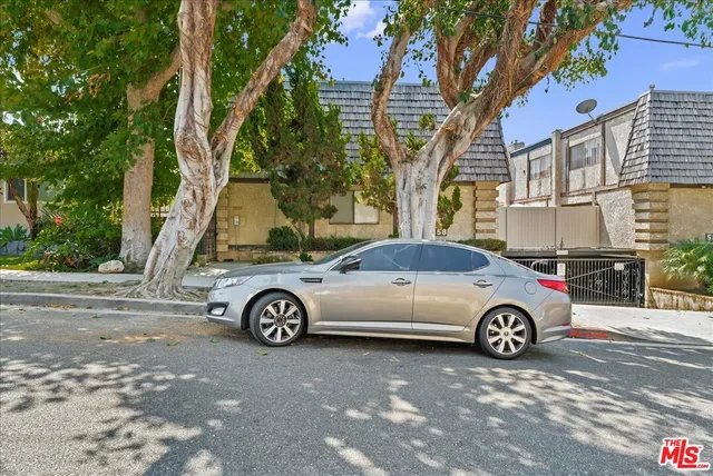 a car parked in front of a house