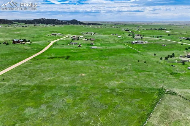 a view of a lush green field
