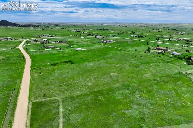 a view of a golf course with a park