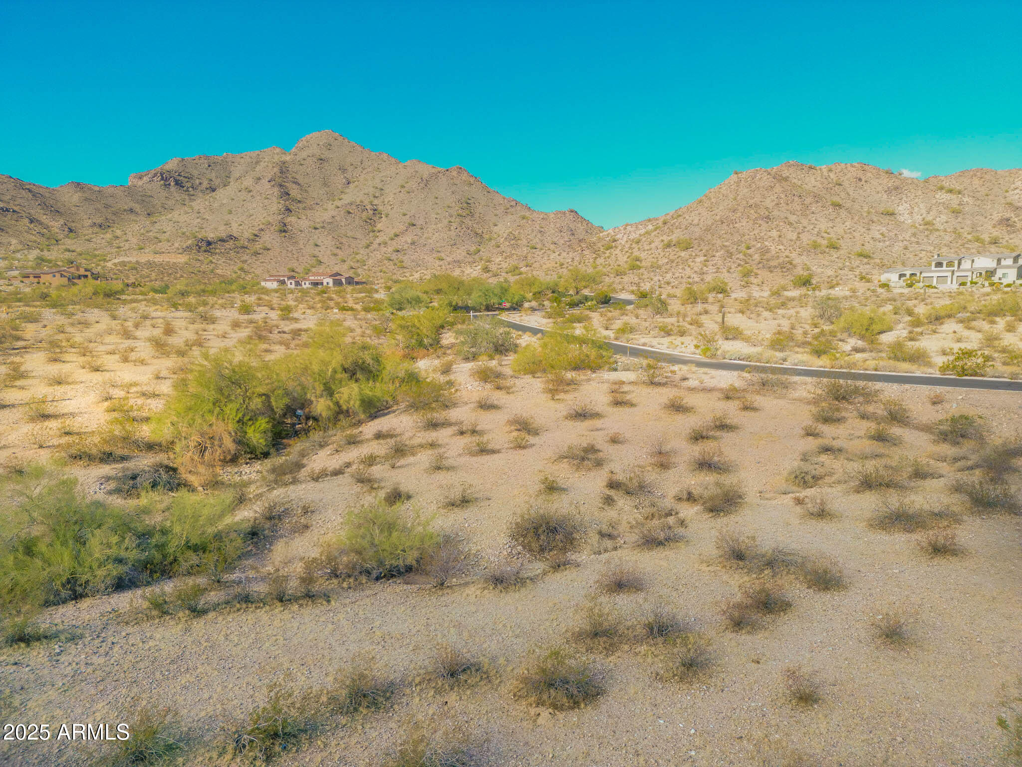 21287 North Black Rock Road, Unit 96 Buckeye, AZ 85396 - Photo 14 of 53 a view of a dry yard