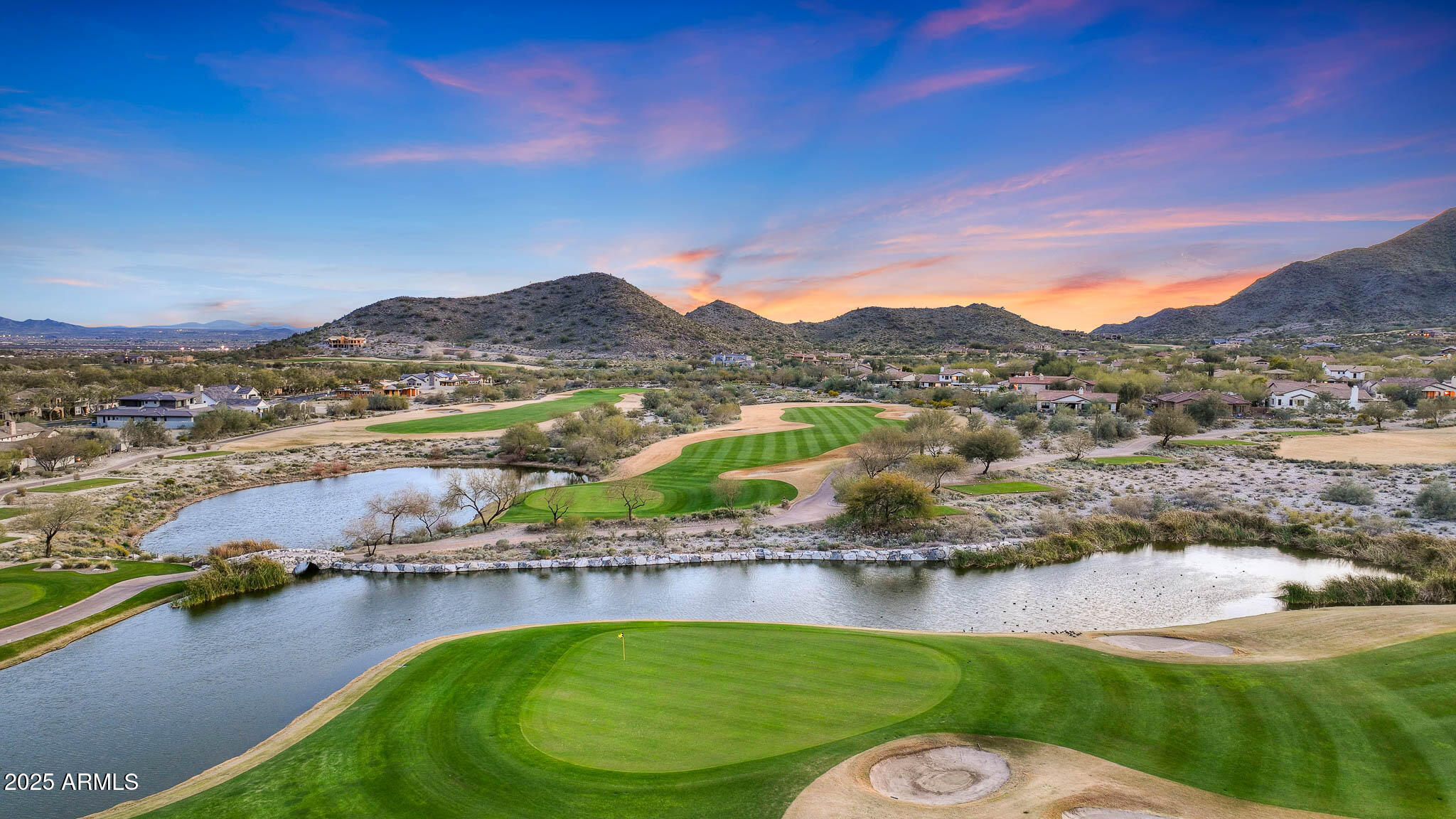 21287 North Black Rock Road, Unit 96 Buckeye, AZ 85396 - Photo 40 of 53 a view of a lake with a mountain