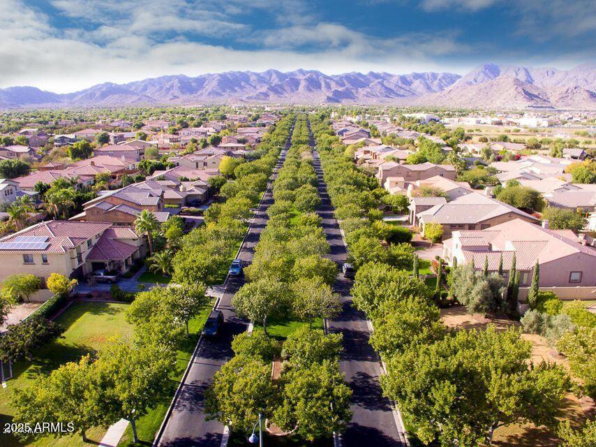 21287 North Black Rock Road, Unit 96 Buckeye, AZ 85396 - Photo 49 of 53 an aerial view of residential houses with outdoor space