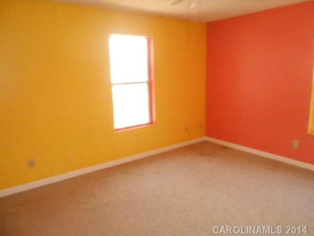 7441 Tuckaseegee Road Kannapolis, NC 28081 - Photo 5 of 14 a view of an empty room with a window