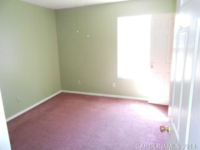 7441 Tuckaseegee Road Kannapolis, NC 28081 - Photo 9 of 14 a view of an empty room and window