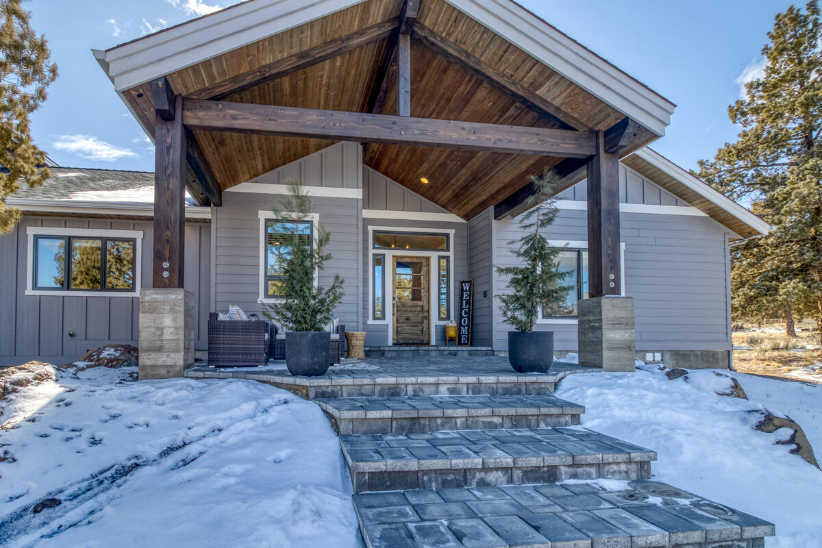 Timber Frame Front Porch with 'Board Formed' Concrete Columns