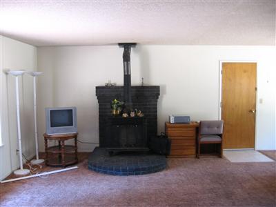 42909 Ranger Cir Court Coarsegold, CA 93614 - Photo 1 of 10 fireplace in living room