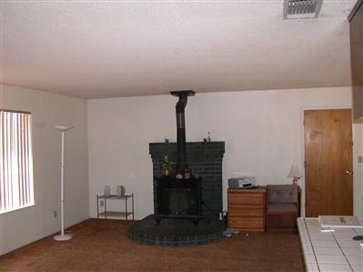 42909 Ranger Cir Court Coarsegold, CA 93614 - Photo 9 of 10 fireplace and garage entry