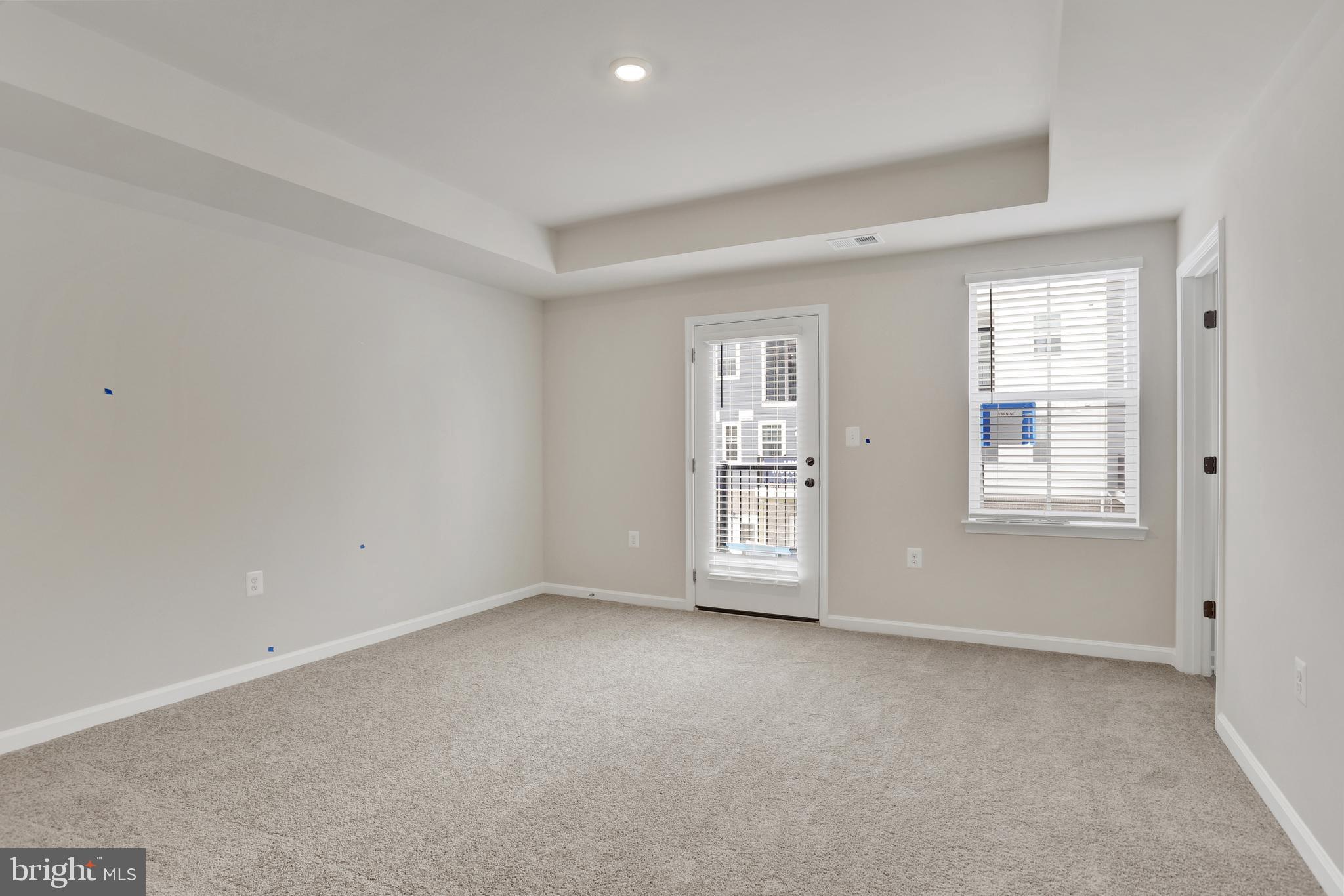 9664 Swallowtail Lane Manassas, VA 20110 - Photo 26 of 95 an empty room with windows