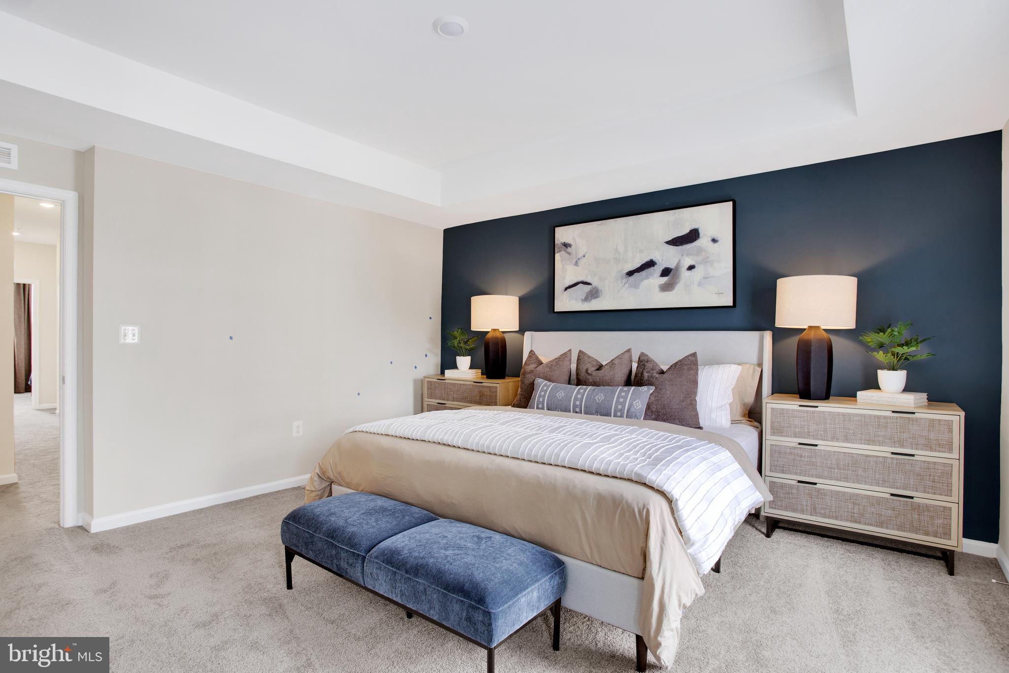 9664 Swallowtail Lane Manassas, VA 20110 - Photo 29 of 95 a bedroom with a bed and a night stand
