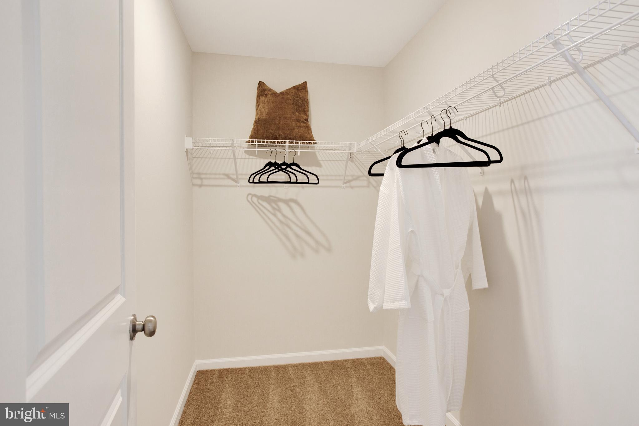 9664 Swallowtail Lane Manassas, VA 20110 - Photo 33 of 95 a view of small space with racks on the wall