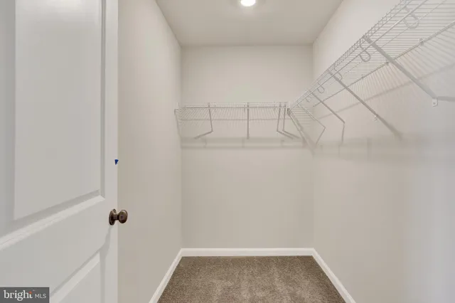 a front view of a building with street view