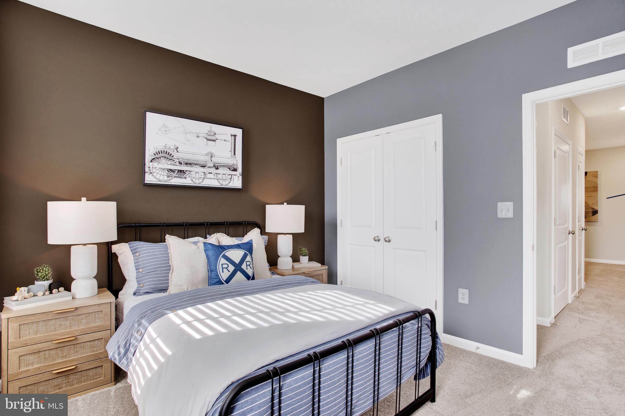 9664 Swallowtail Lane Manassas, VA 20110 - Photo 39 of 95 a bedroom with a bed and a wall painting