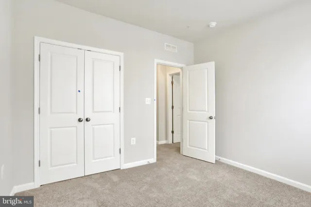 a view of a swimming pool with a yard