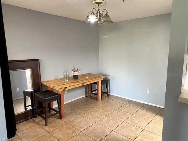 a view of a workspace with furniture