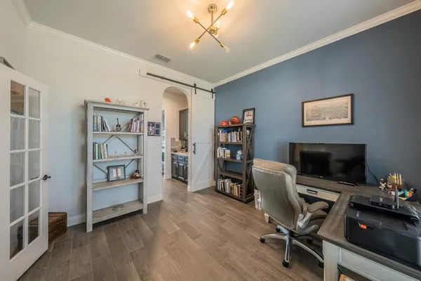 a kitchen with cabinets a sink stainless steel appliances and a counter top space