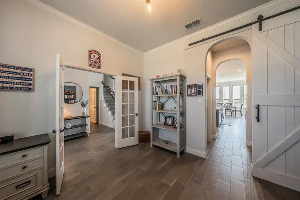 a view of a livingroom with furniture and window