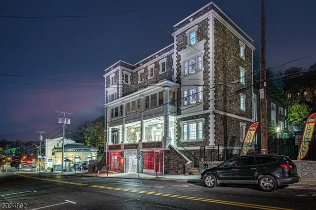 a view of street with parked cars