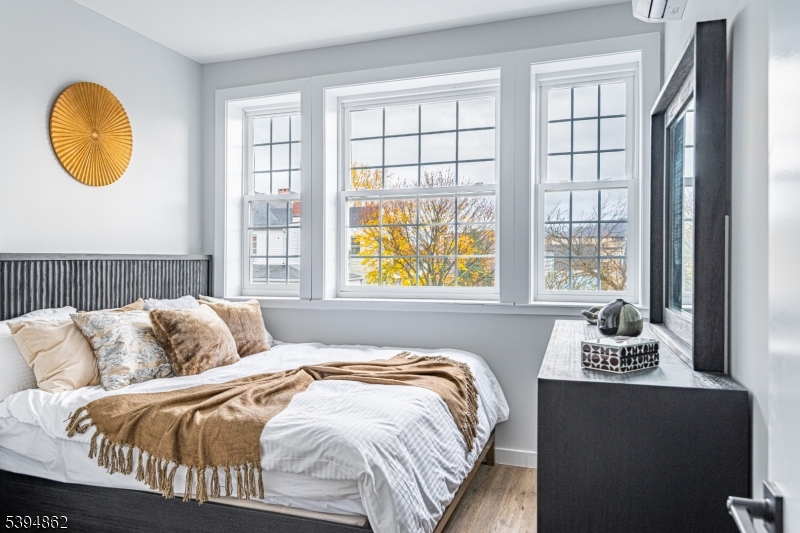 75 South Main Street, Unit 405 Phillipsburg, NJ 08865 - Photo 17 of 22 a bedroom with a bed and a window