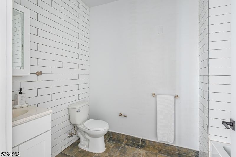 75 South Main Street, Unit 405 Phillipsburg, NJ 08865 - Photo 19 of 22 a bathroom with a toilet and a shower
