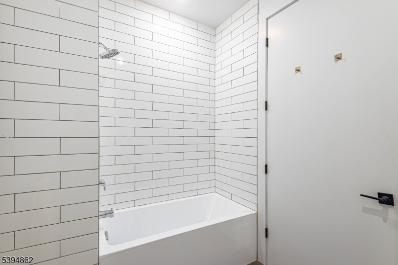 75 South Main Street, Unit 405 Phillipsburg, NJ 08865 - Photo 20 of 22 a bathroom with a bathtub