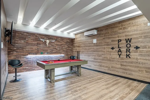 a room with furniture and wooden floor