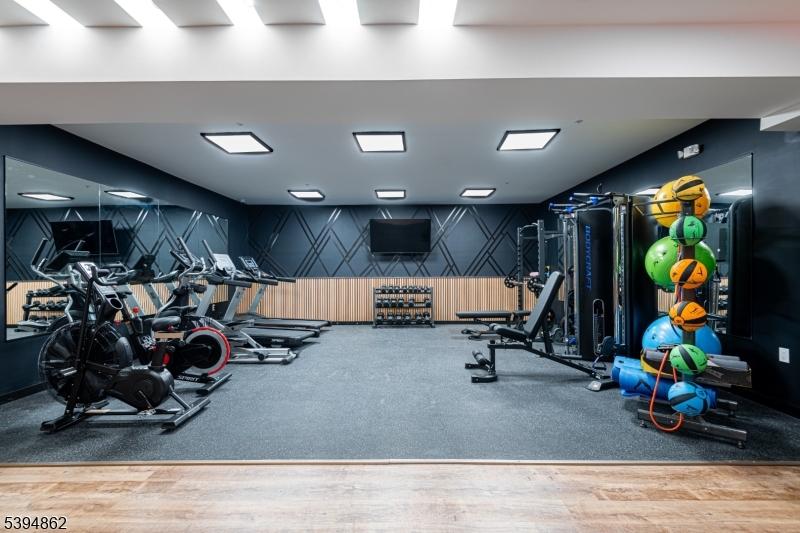 75 South Main Street, Unit 405 Phillipsburg, NJ 08865 - Photo 6 of 22 a view of a room with gym equipment