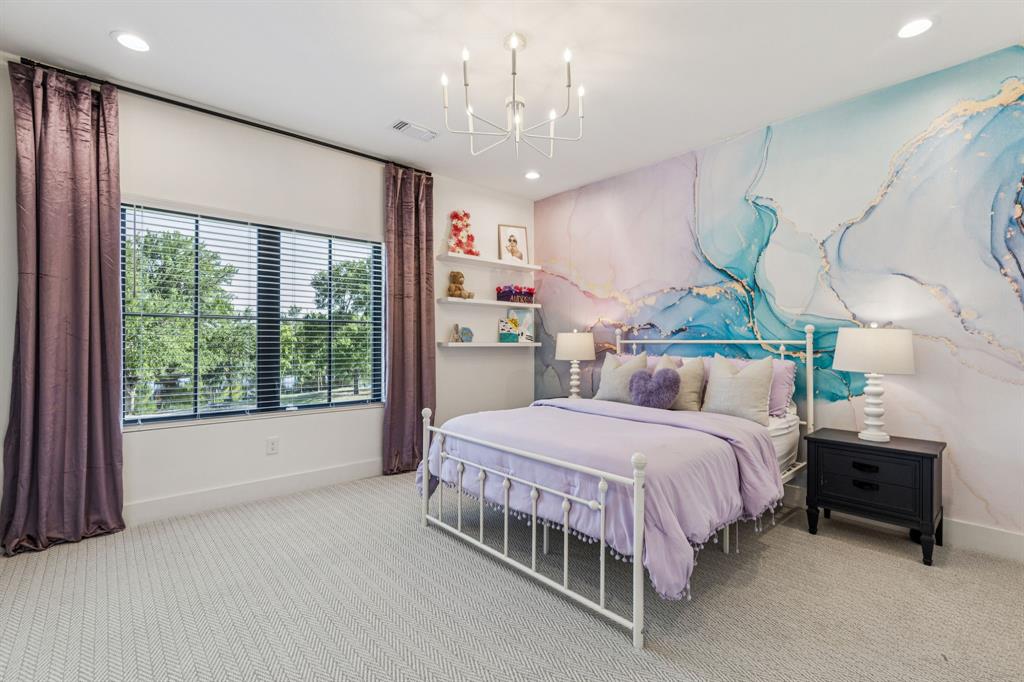 1890 McConnell Road Gunter, TX 75058 - Photo 30 of 40 a bedroom with a bed table and window