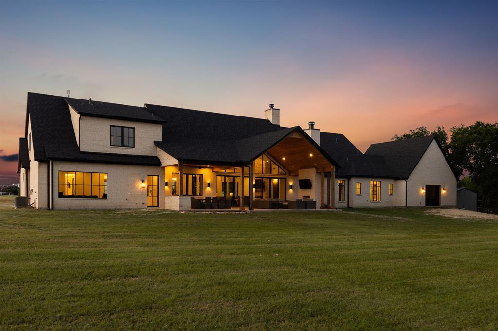 1890 McConnell Road Gunter, TX 75058 - Photo 37 of 40 a big room with an outdoor space