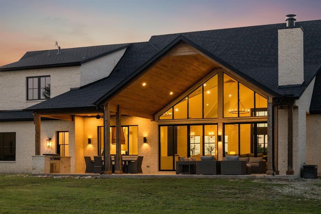 1890 McConnell Road Gunter, TX 75058 - Photo 38 of 40 a front view of a house with a garden