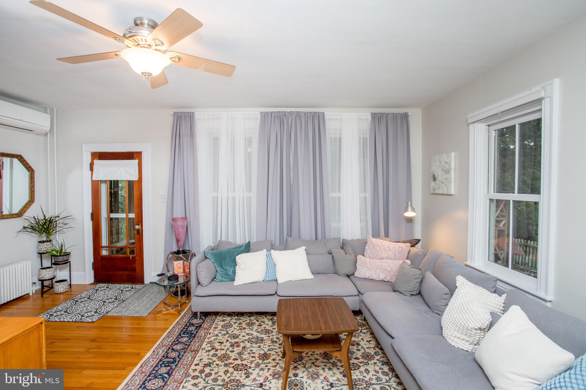 917 Easton Road Riegelsville, PA 18077 - Photo 11 of 106 a bedroom with furniture and a large window