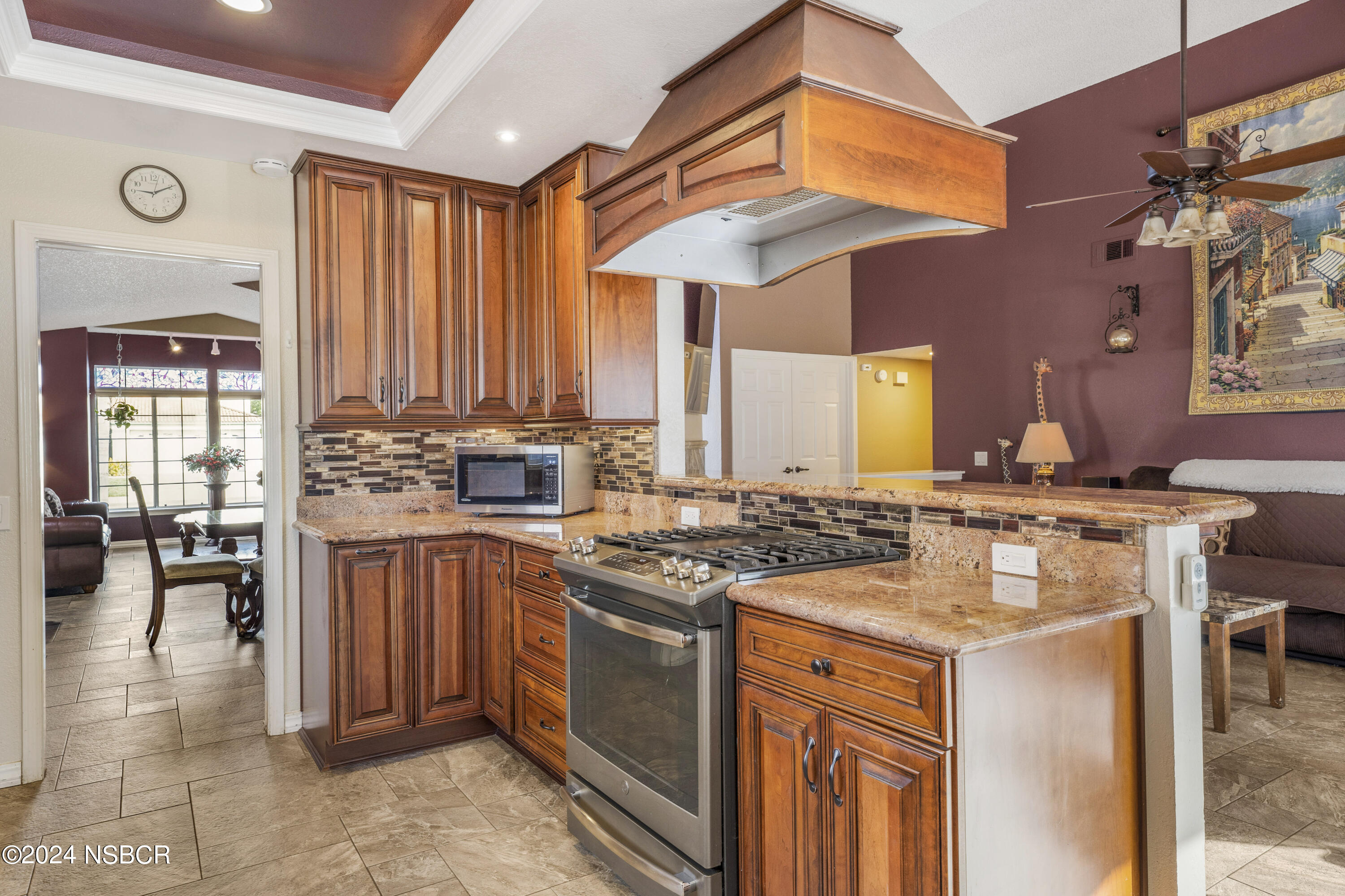 816 Cooper Drive Lompoc, CA 93436 - Photo 8 of 35 a kitchen with a stove a sink and a refrigerator