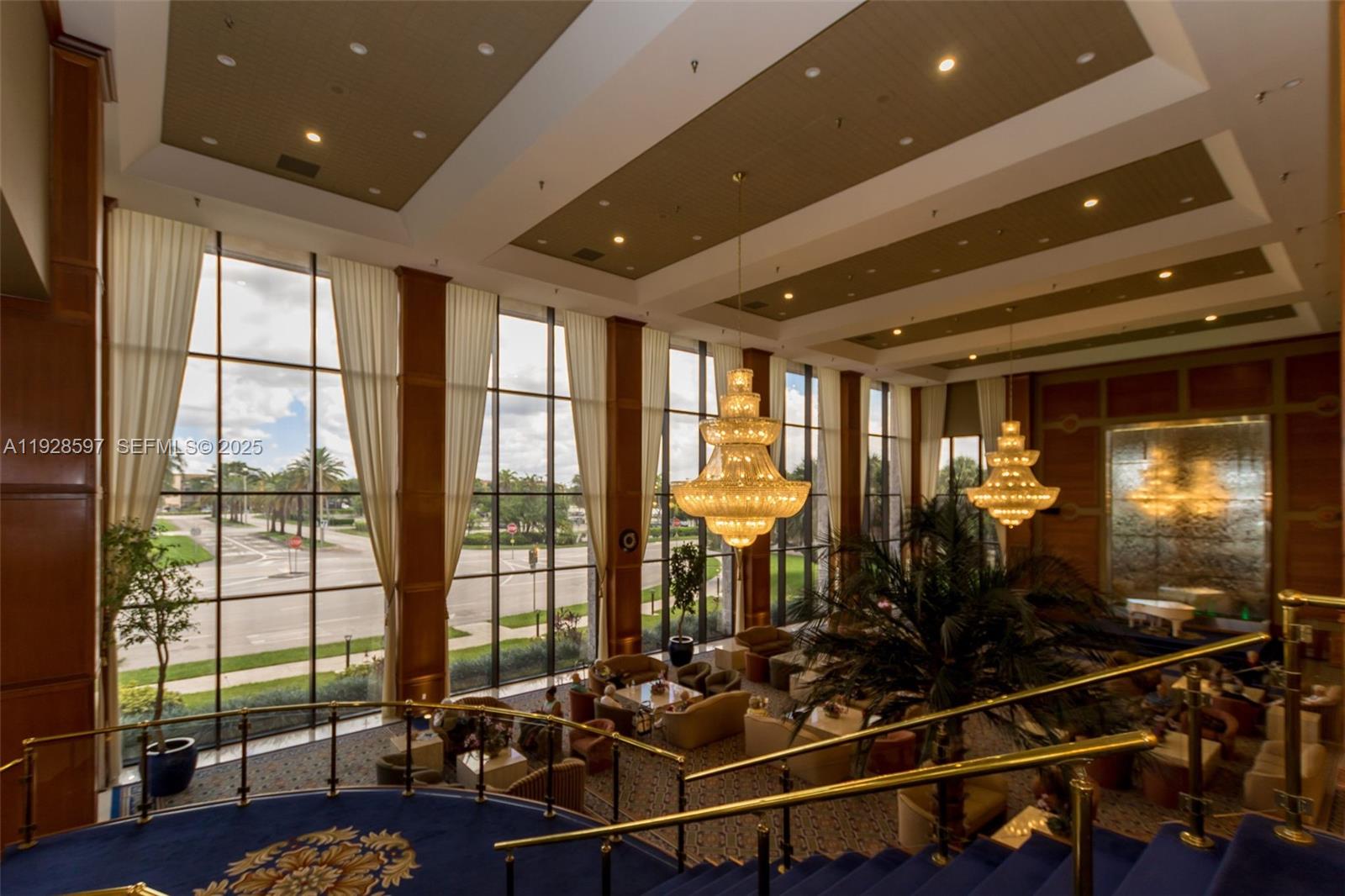 1201 Southwest 141st Avenue, Unit 304J Pembroke Pines, FL 33027 - Photo 17 of 31 a room with gym equipment and a large window