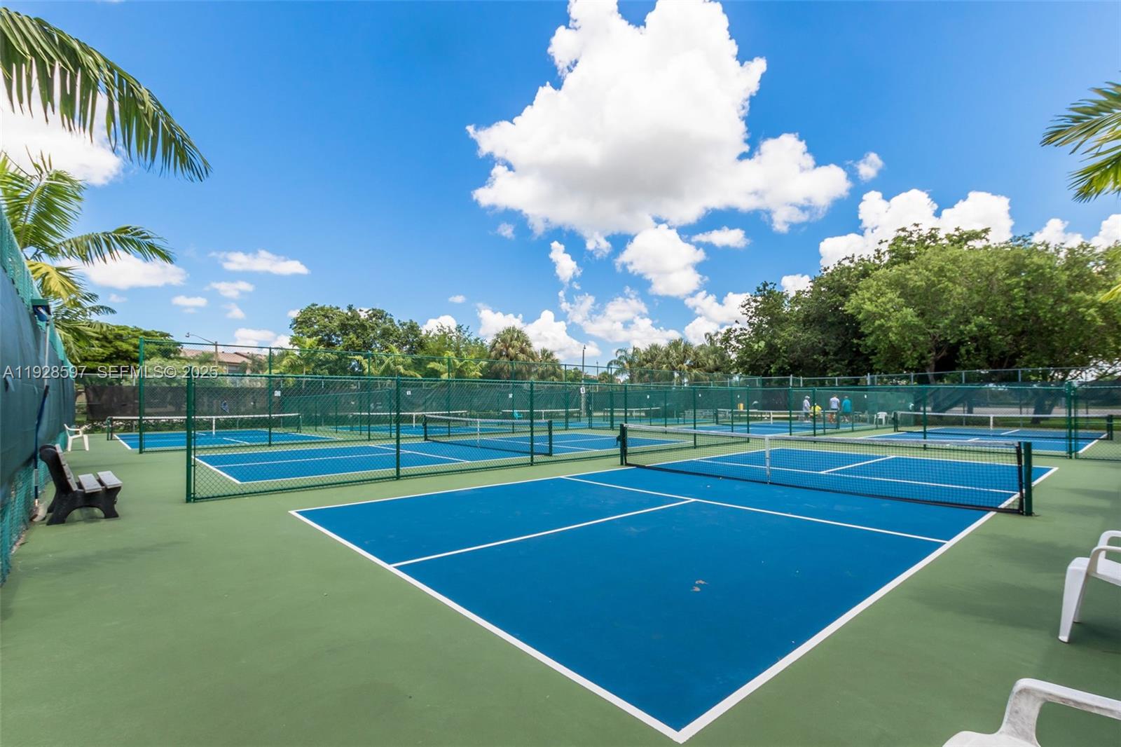 1201 Southwest 141st Avenue, Unit 304J Pembroke Pines, FL 33027 - Photo 24 of 31 a view of tennis court