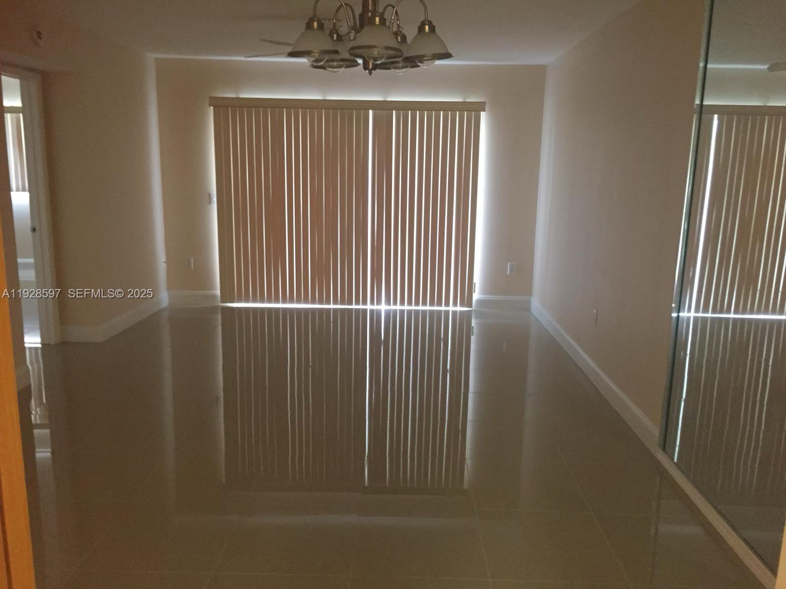 1201 Southwest 141st Avenue, Unit 304J Pembroke Pines, FL 33027 - Photo 7 of 31 a view of wooden floor