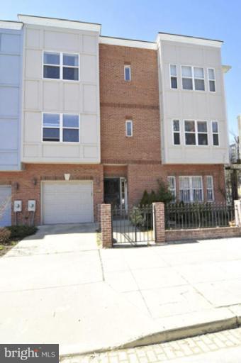 2104 10th Street Northwest Washington, DC 20001 - Photo 2 of 2 a front view of a building with glass windows