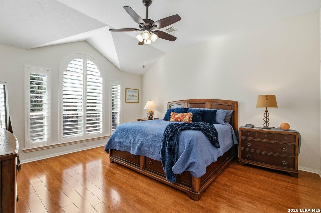 318 River Ridge Boerne, TX 78006 - Photo 18 of 46 a bedroom with a bed dresser and a window