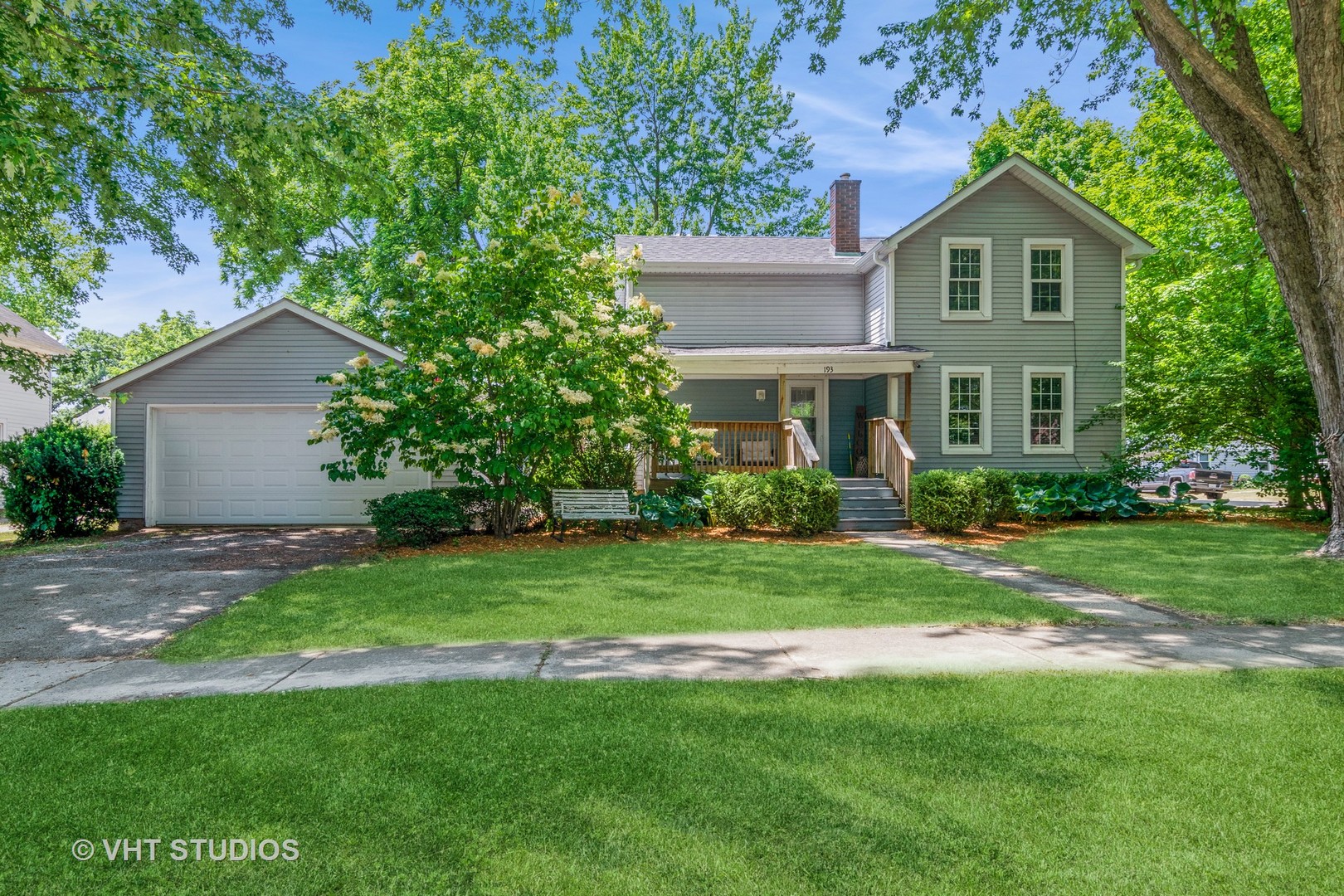 Undisclosed Address Hinckley, IL 60520 - Photo 1 of 10 a front view of a house with a yard and trees