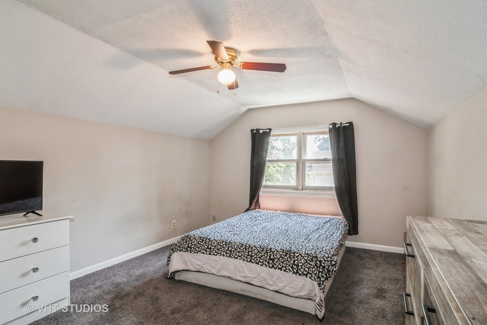 Undisclosed Address Hinckley, IL 60520 - Photo 6 of 10 a bedroom with a bed and a flat screen tv