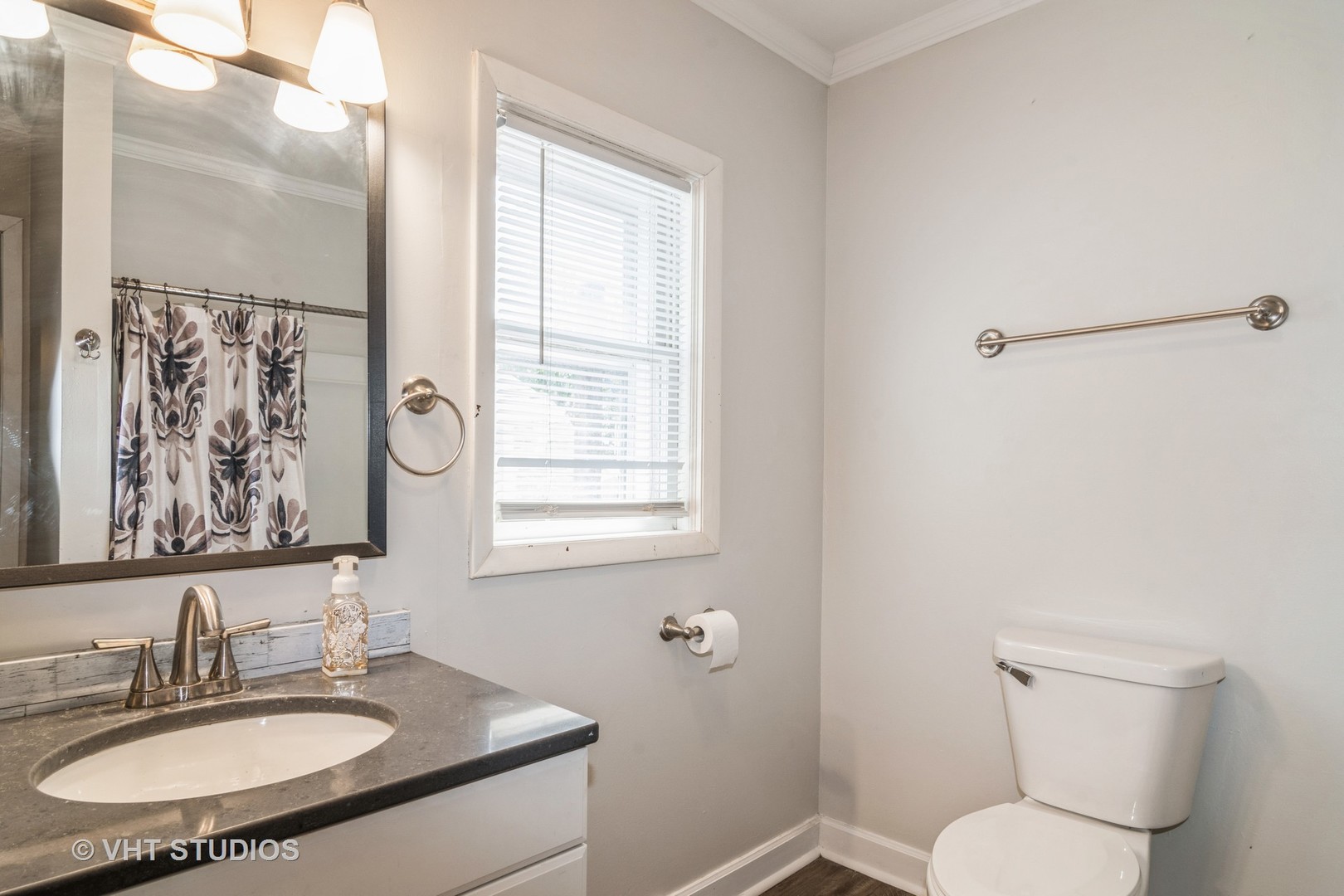 Undisclosed Address Hinckley, IL 60520 - Photo 9 of 10 a bathroom with a toilet sink and mirror
