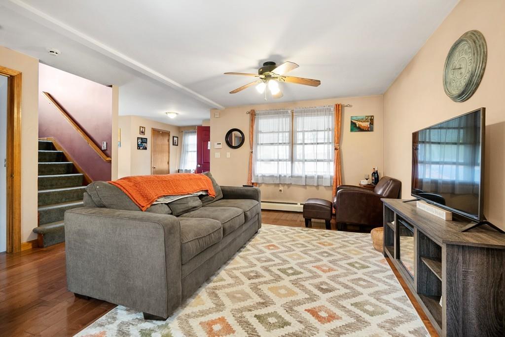 150 Lower Gore Road Webster, MA 01570 - Photo 3 of 20 a living room with furniture flat screen tv and a window