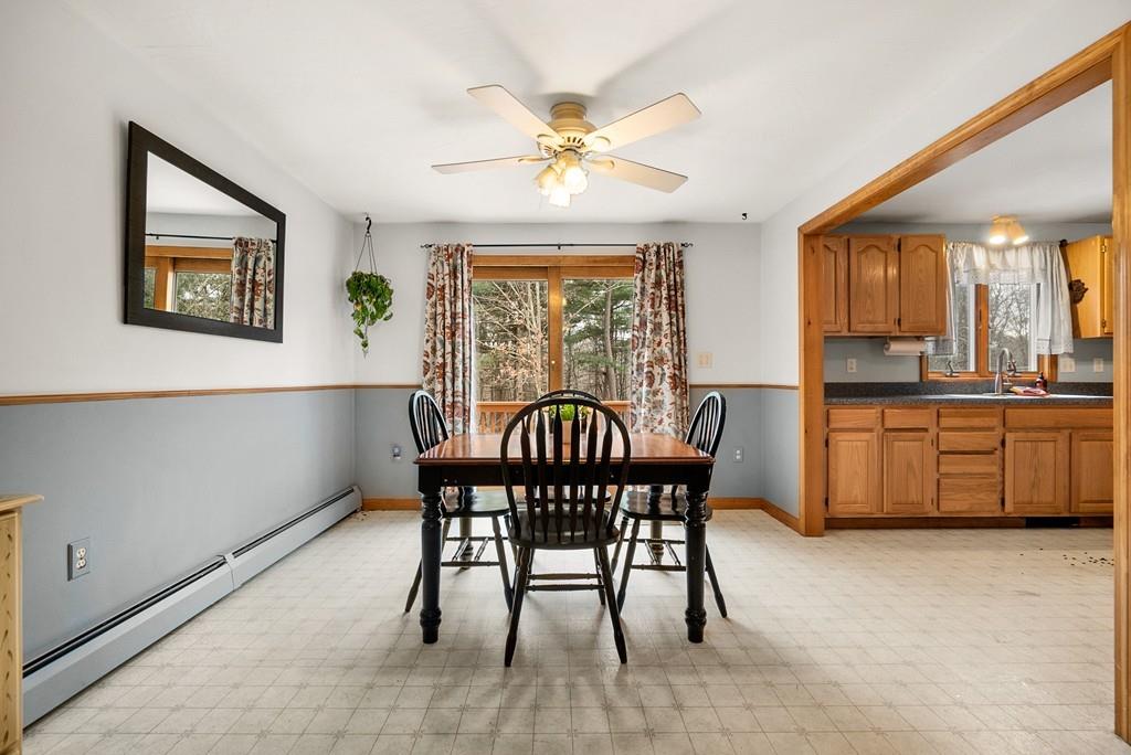 150 Lower Gore Road Webster, MA 01570 - Photo 7 of 20 a view of a dining room with furniture window and outside view
