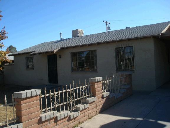 1721 East Pecan Road Phoenix, AZ 85040 - Photo 2 of 5 Carport-front yard fencing